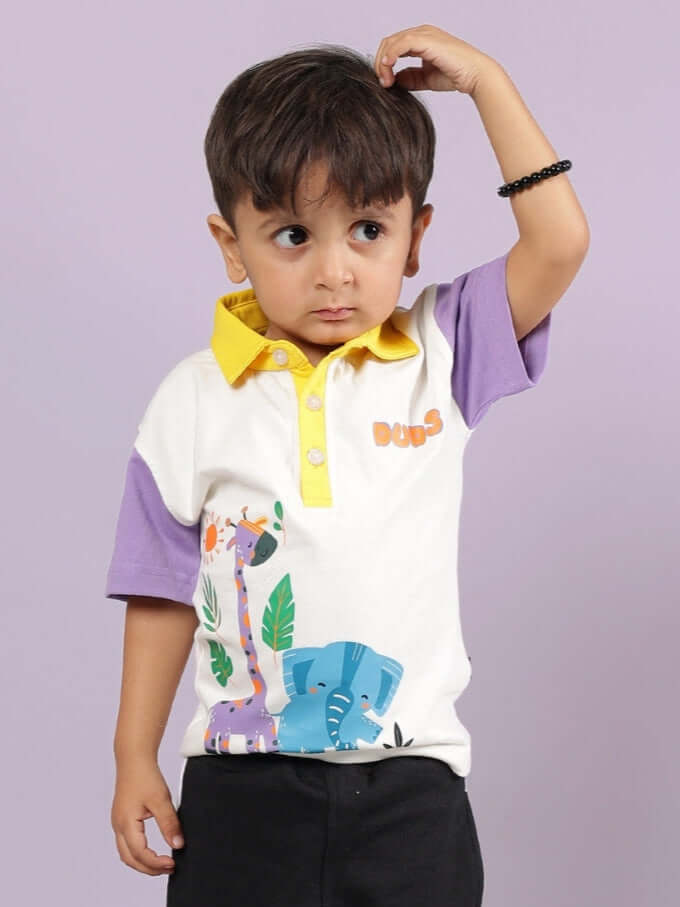 Child wearing Borneo oversized off-white t-shirt with animal graphics, suitable for boys and girls, by DUDS.