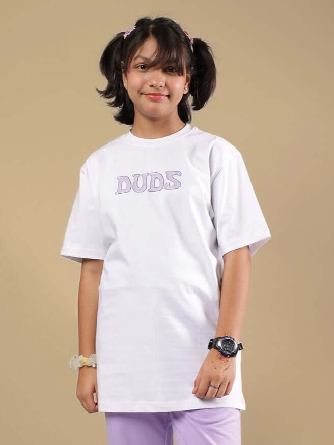 Child wearing DUDS white T-shirt, part of the Knight Ryder collection for boys and girls, featuring comfortable fit and style for kids.