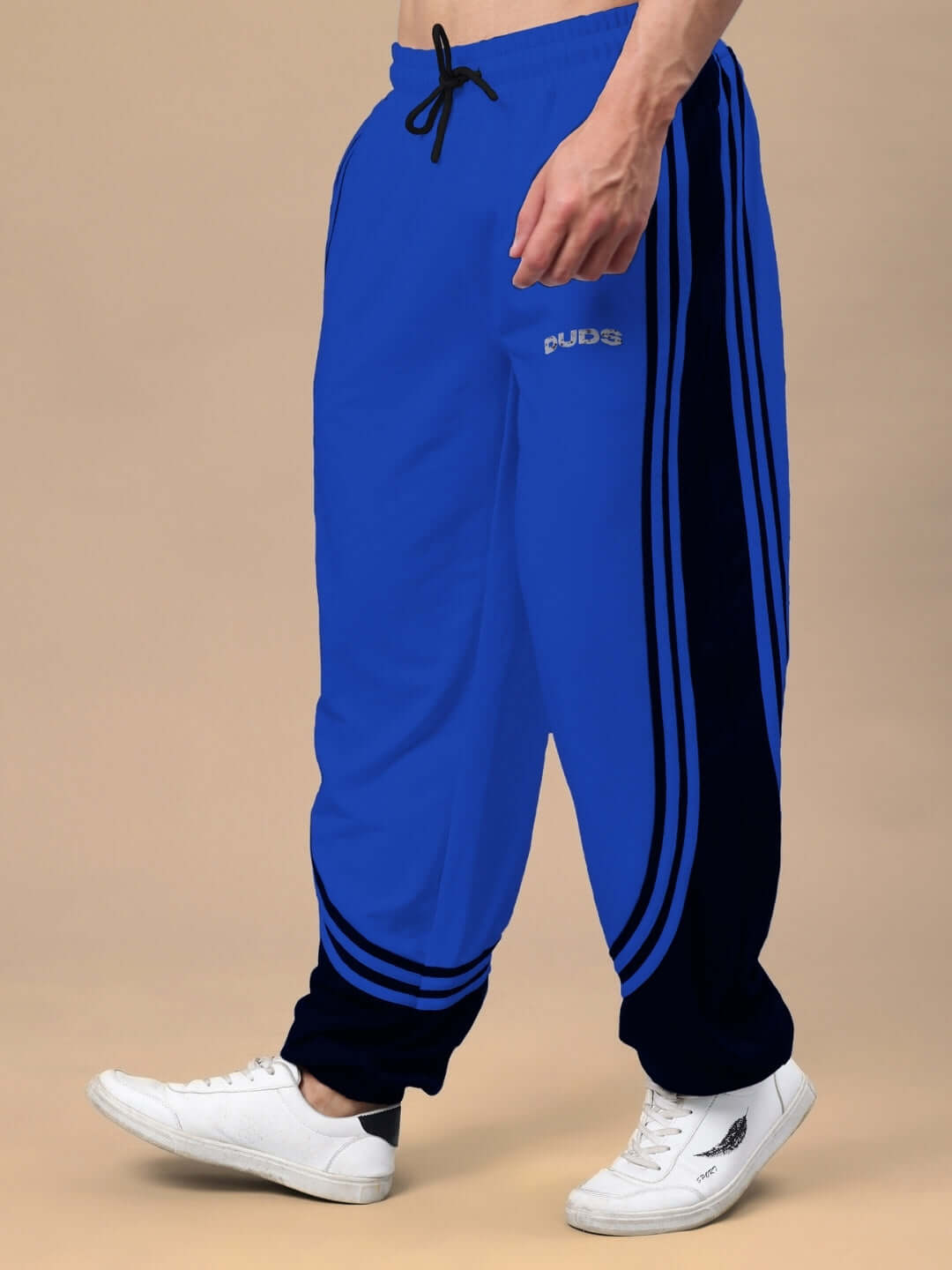 Frenzy Curve Contrast Joggers in blue and black, featuring a tailored fit and stylish design by DUDS. Customizable sizes available.