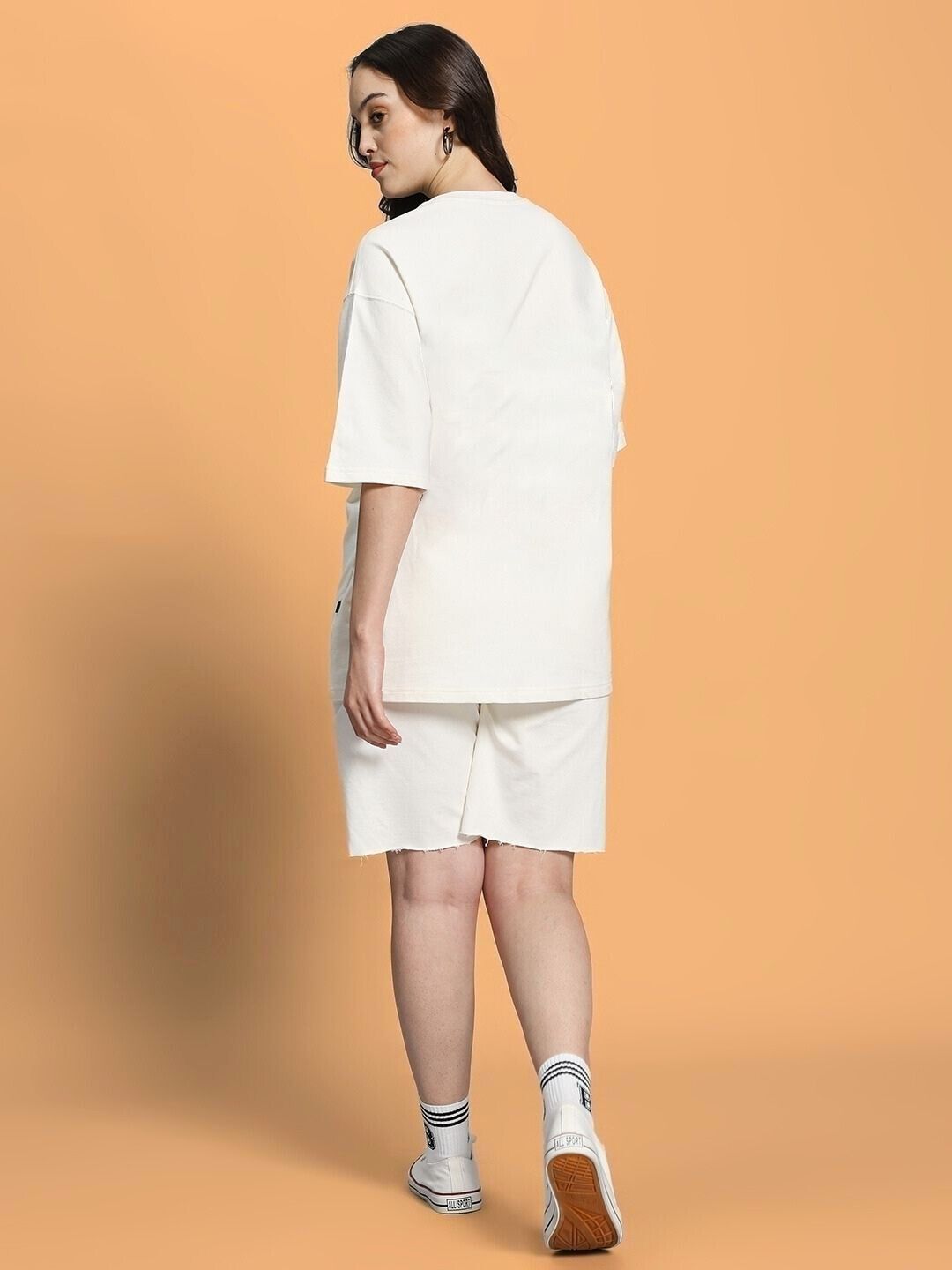 Back view of WOMEN CLOUD PRINTED CO-ORD SET OFF WHITE showcasing a relaxed-fit top and bottoms with soft cloud prints.