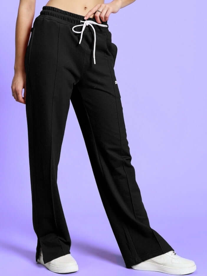 Women's Zion side slit joggers in black, featuring comfortable fit and stylish design, perfect for custom tailoring by DUDS.