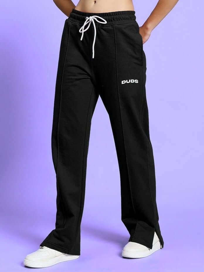 Women's Zion side slit joggers in black by DUDS, featuring a comfortable fit and customizable size options, perfect for stylish lounging.