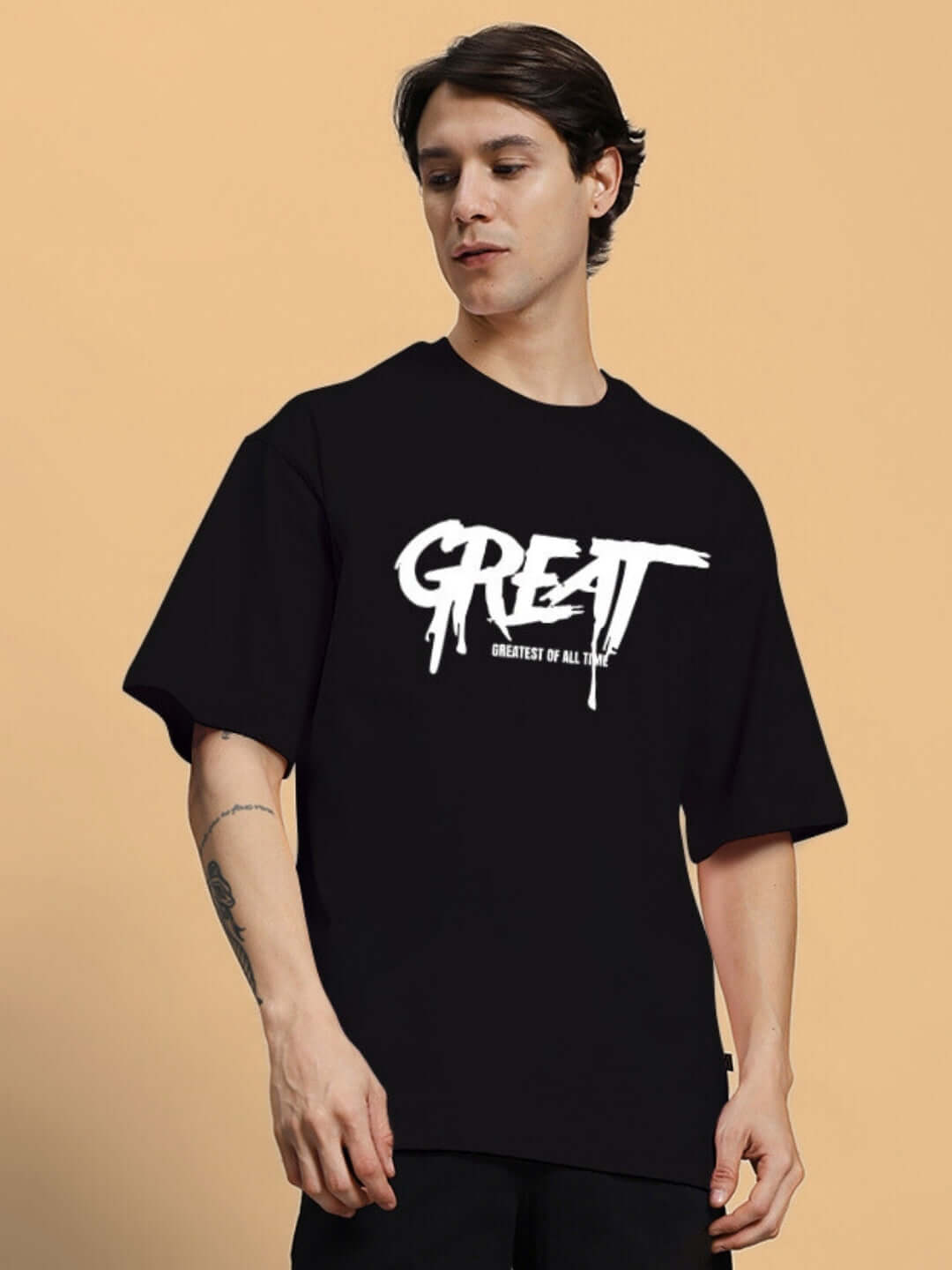 Model wearing GREAT printed oversized black t-shirt, 100% cotton, ideal for comfort and style, premium fabric from Color By Colours.