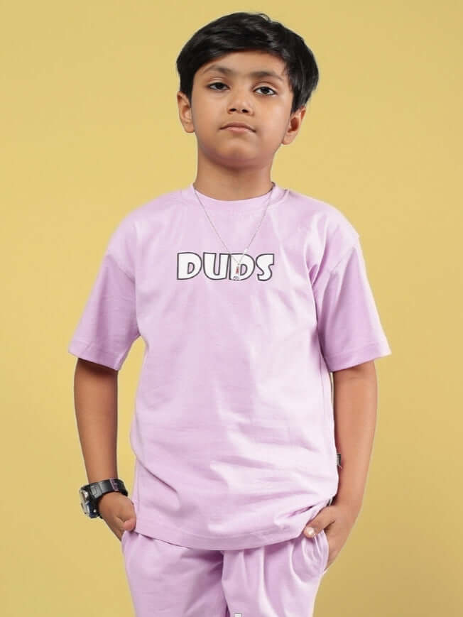 Boy wearing lilac WOLF PACK T-shirt from DUDS, casual outfit for boys and girls, customizable sizes.