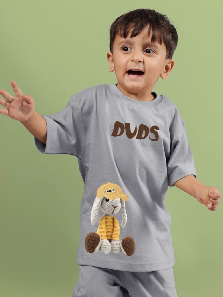 Child wearing a grey unisex Flint Bunny t-shirt with bunny graphic, suitable for boys and girls.