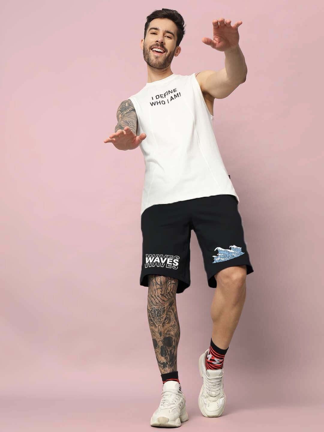 Man wearing 3D WAVES REGULAR FIT SHORTS BLACK showcasing style and comfort.