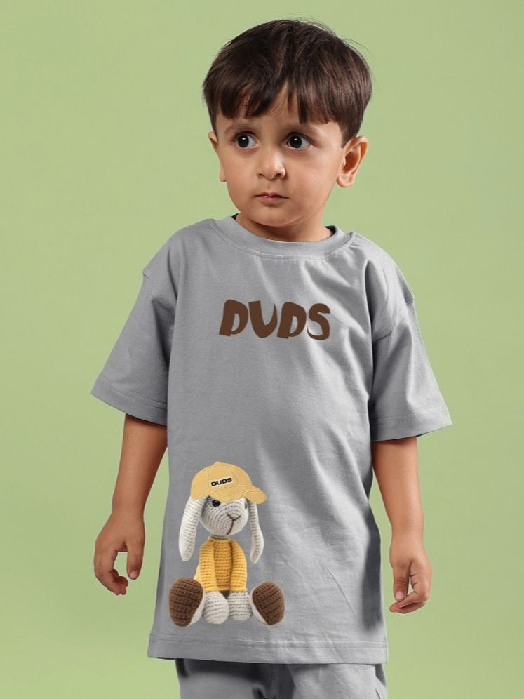 Child wearing Flint Bunny T-shirt for boys and girls in grey with bunny graphic print.