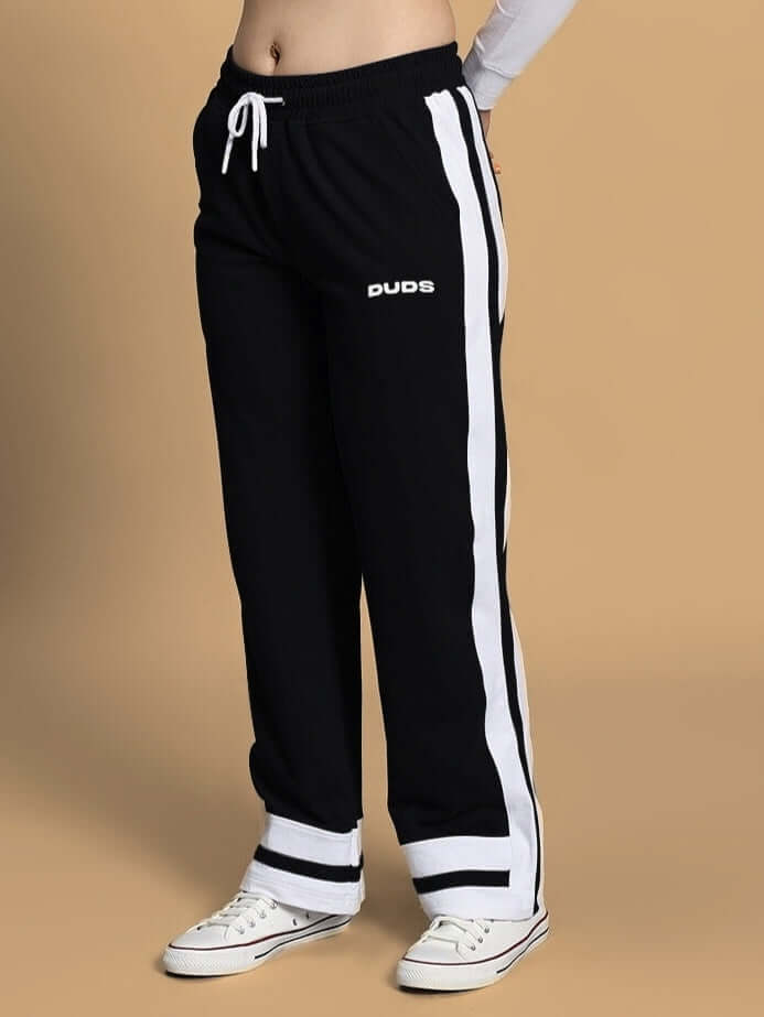 Women's black jogger pants with side stripe design by DUDS, featuring custom fit option and premium tailoring.