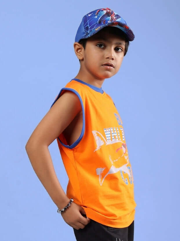 Child wearing orange Buffy t-shirt for boys and girls, showcasing casual fit. Ideal for comfortable wear. Available with custom fit option.