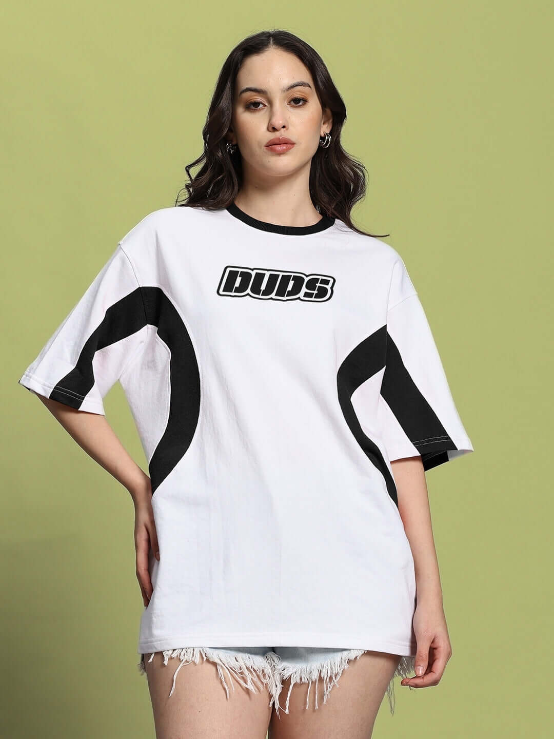 Women's oversized white-black EZEL t-shirt in premium cotton, featuring bold black accents and relaxed fit for trendy casual wear.