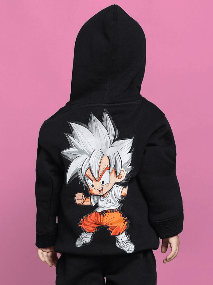 Child wearing a black Gohan hoodie featuring a cartoon character design, perfect for boys and girls. Comfortable and stylish kids' fashion.