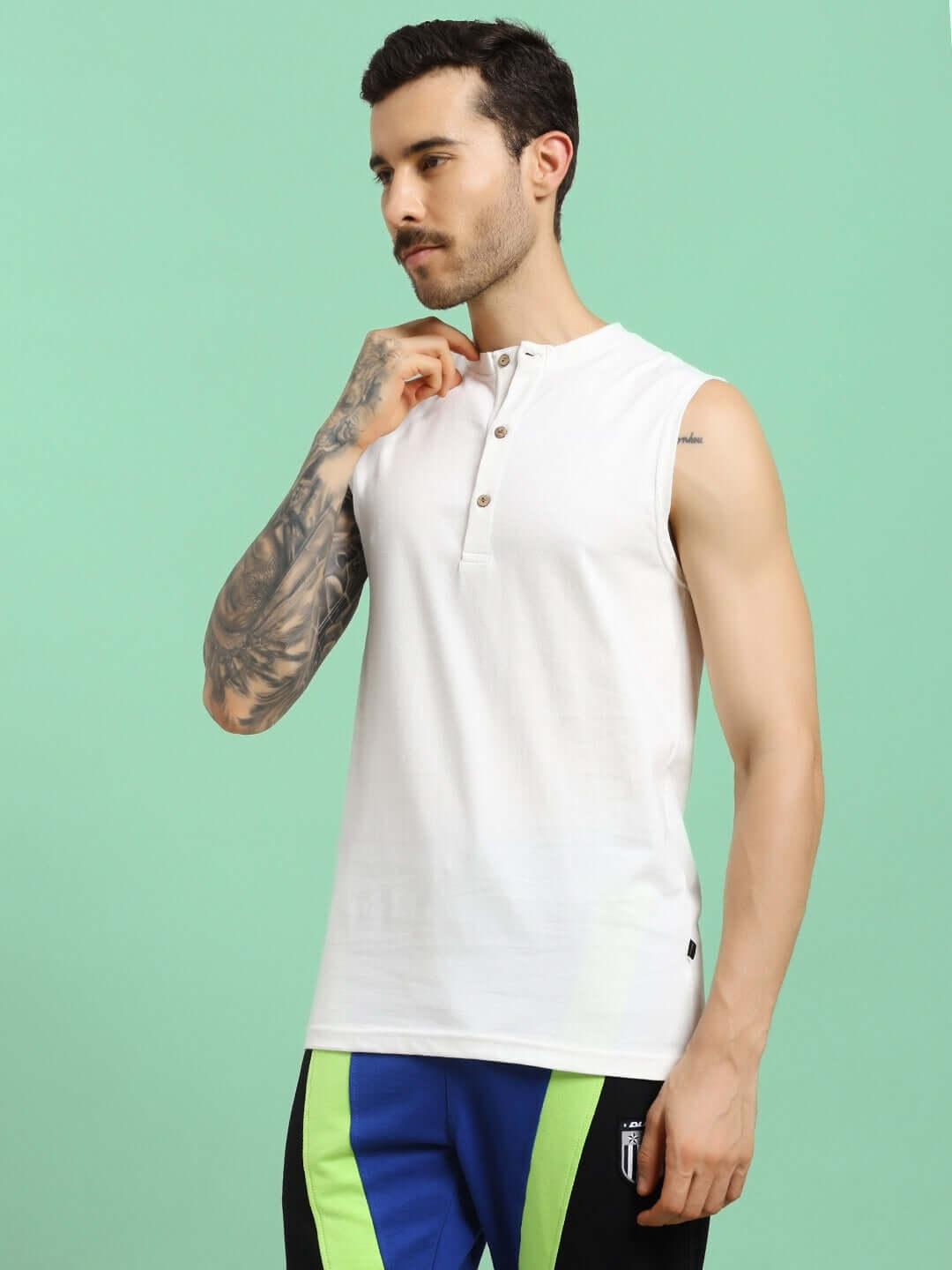 Man wearing OLIN Regular Fit T-Shirt in off-white, made from premium heavy cotton slub fabric, stylish and versatile for casual wear.