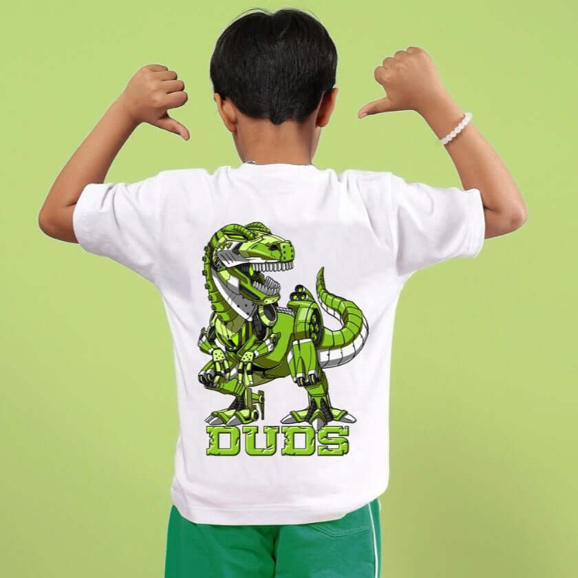 Child wearing Robo Rex oversized white T-shirt with green dinosaur print, ideal for boys and girls, made by DUDS.