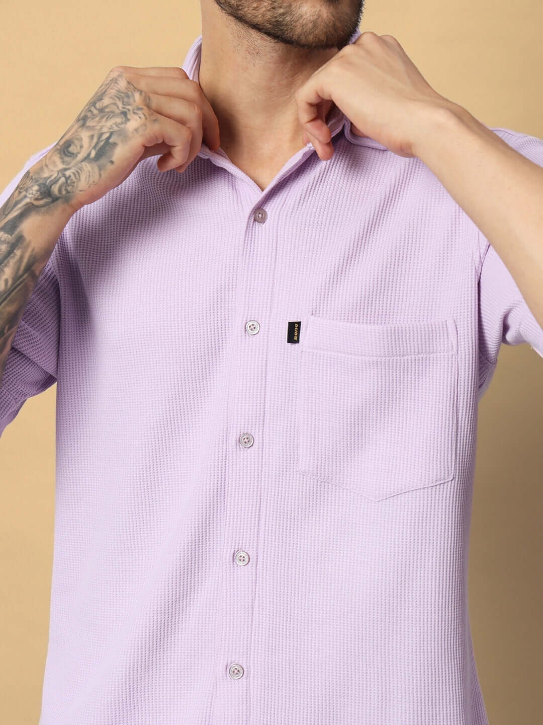 Model wearing lilac waffle fabric co-ord set, 100% cotton, solid design, relaxed fit, India origin, 240 GSM, half sleeves.