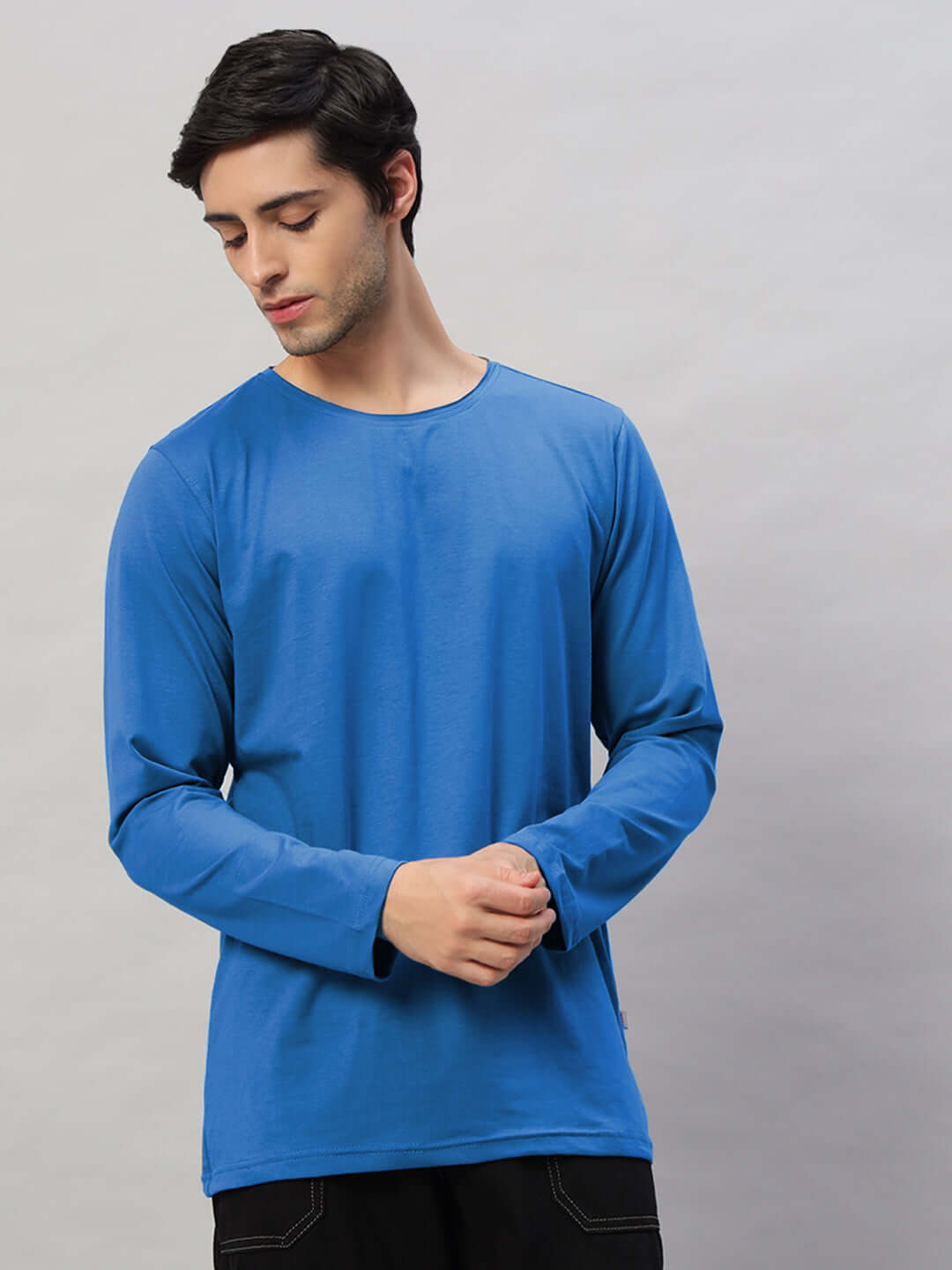 OMNI slim fit sweatshirt in rich blue on model, crafted from premium 100% cotton fabric, ideal for stylish comfort and casual wear.
