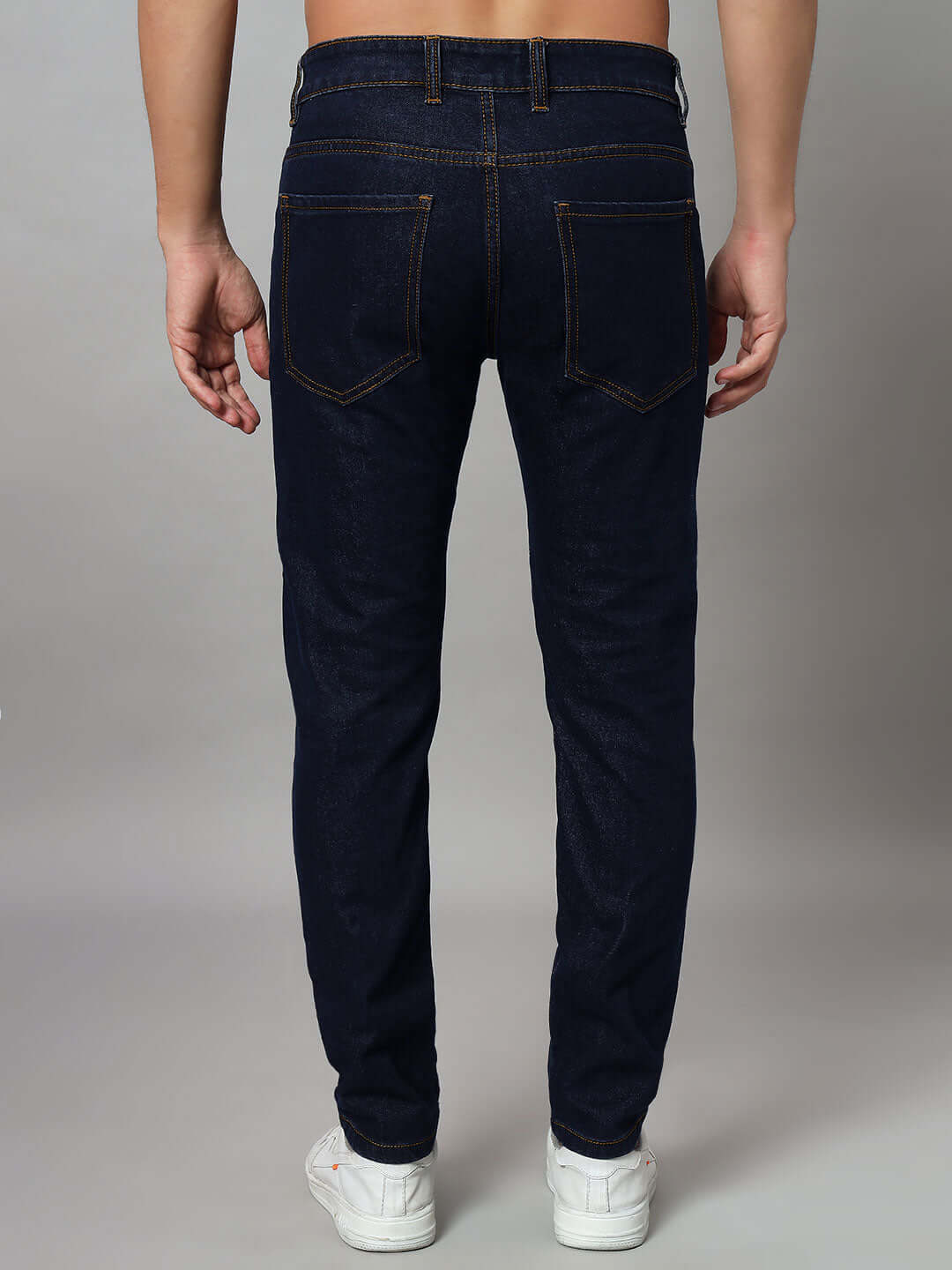 Back view of NOVICE Contrast Stitch Denim Jeans in blue, featuring tailored fit and craftsmanship by DUDS experienced tailors.