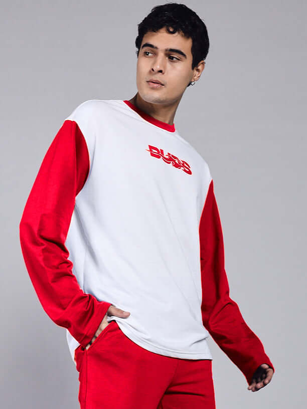Model wearing Celestine Cool Sweatshirt in white and red with premium cotton French terry fabric, designed for comfort and style.