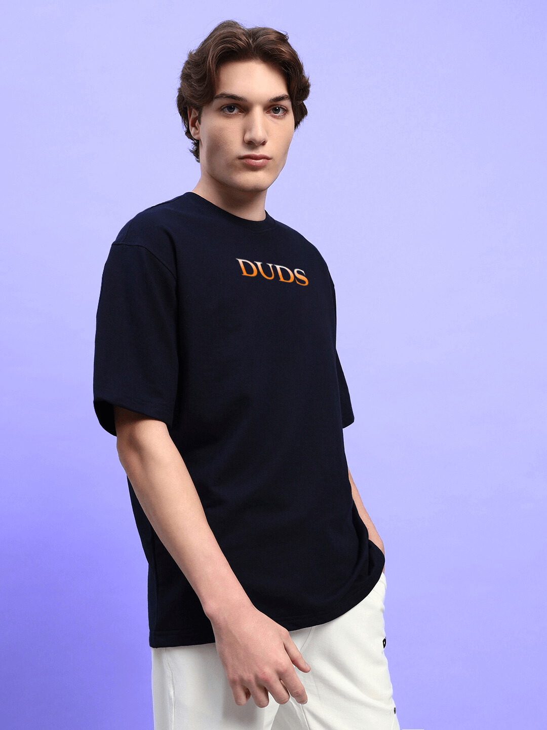 Model wearing HIDDEN POWER PRINTED OVERSIZED T-SHIRT BLACK with bold graphic design, showcasing urban style and relaxed silhouette.