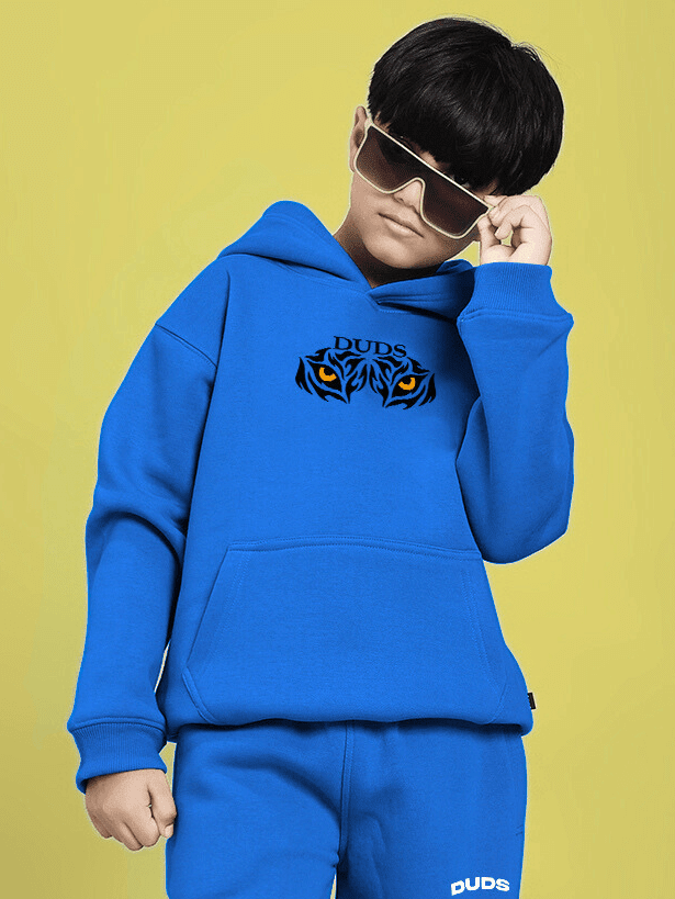 A JOURNEY WITHIN FLEECE HOODIE FOR BOYS AND GIRLS BLUE worn by child, featuring inspiring graphic design and vibrant color.