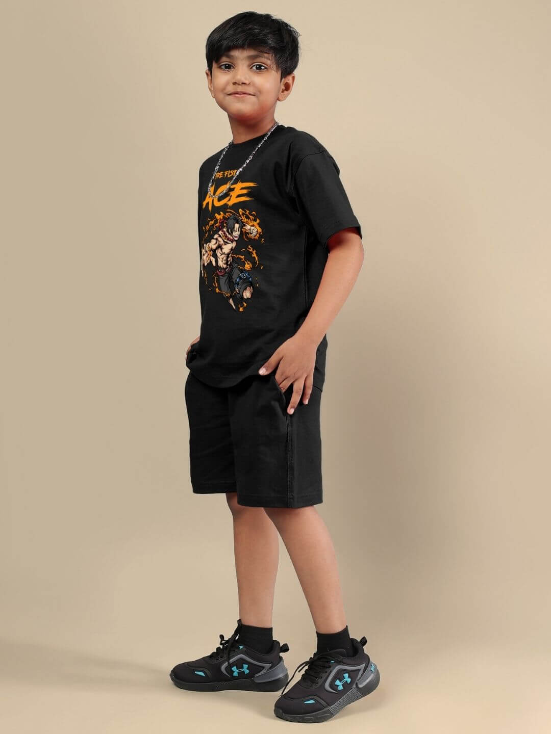 Child wearing ACE co-ord set, black t-shirt and shorts, stylish outfit for boys, premium quality fabric, all-day comfort.