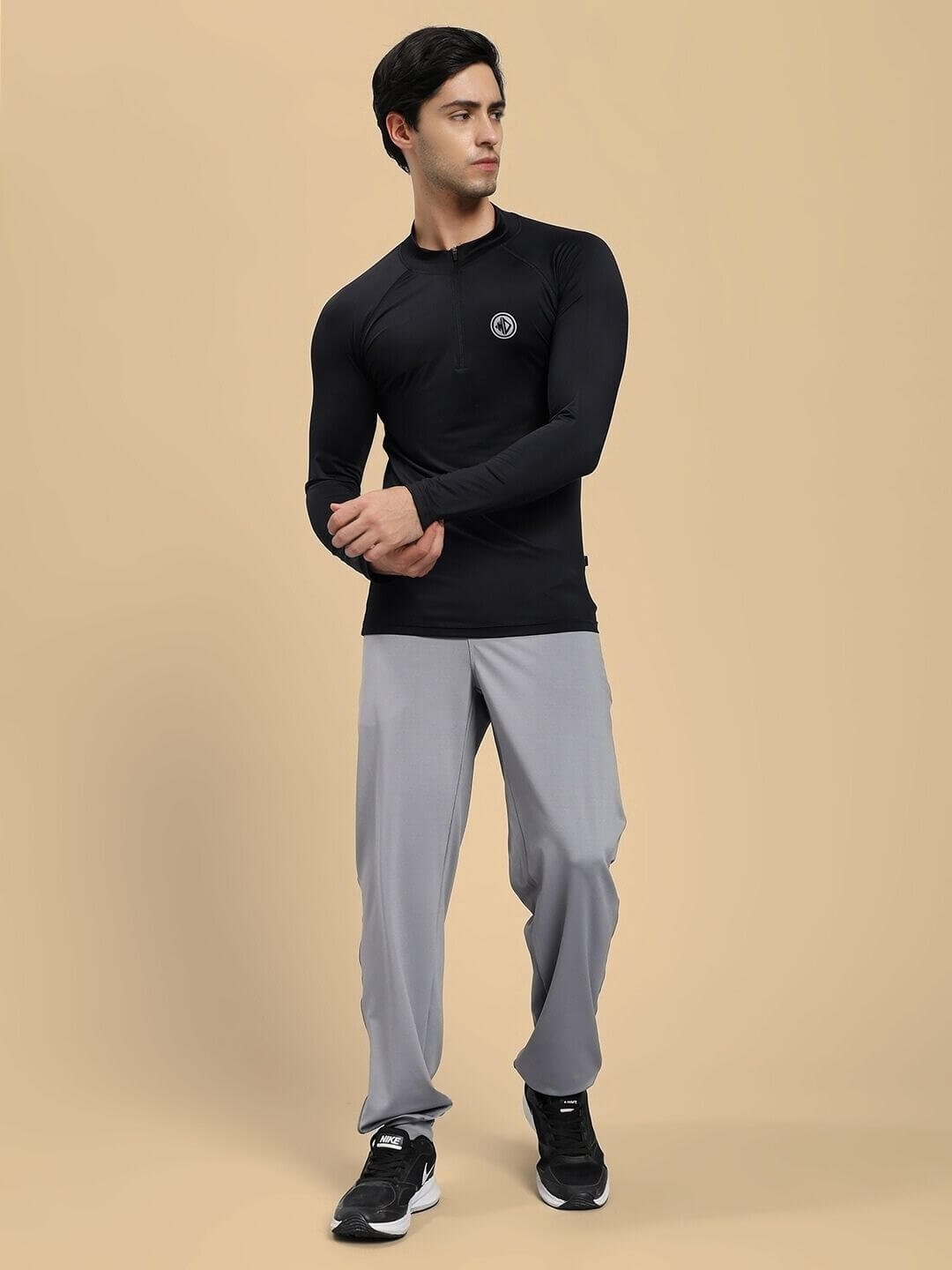 Active lifestyle model wearing ACTIVE FLEX RELAXED FIT JOGGER GREY for comfort and style during workout and casual activities.