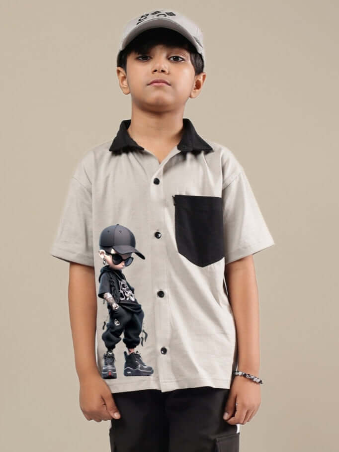 Child wearing ADORABLY grey-black shirt for boys & girls, custom fit option available.