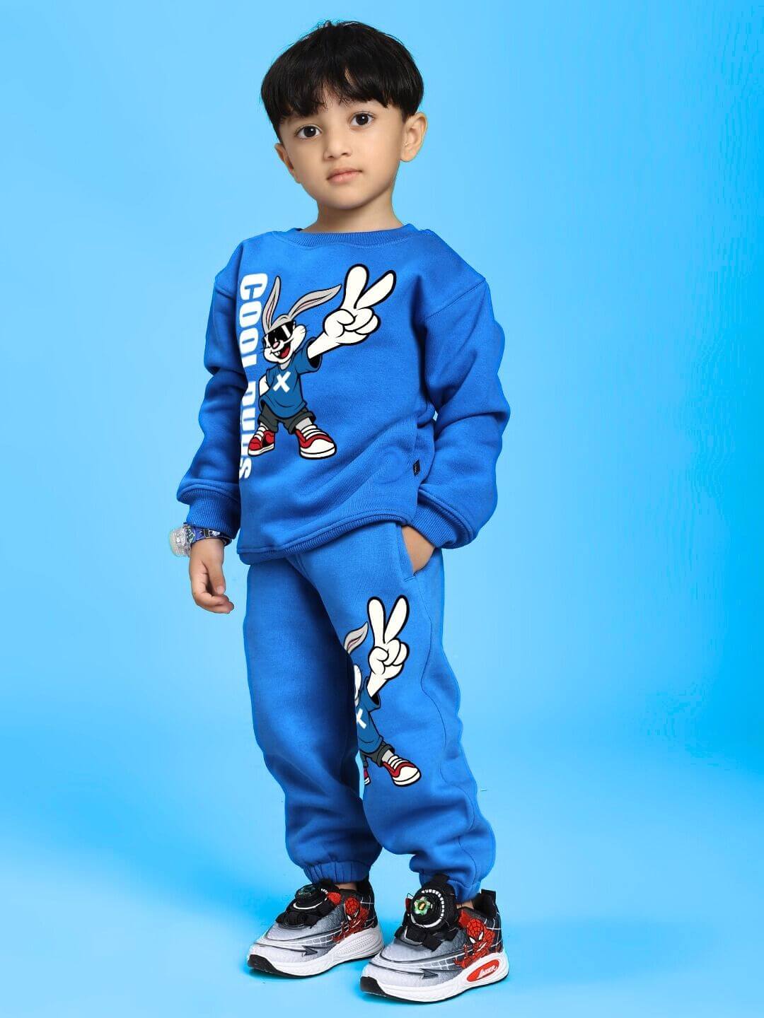Child wearing Adventure Bunny Co-ord for Boys and Girls Blue with playful bunny design, sweatshirt and jogger set.