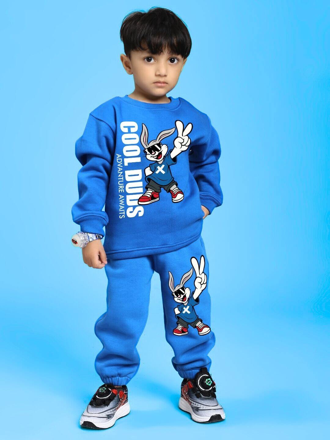 Child wearing Adventure Bunny Co-ord for Boys and Girls Blue, featuring a cozy fleece sweatshirt and matching joggers.