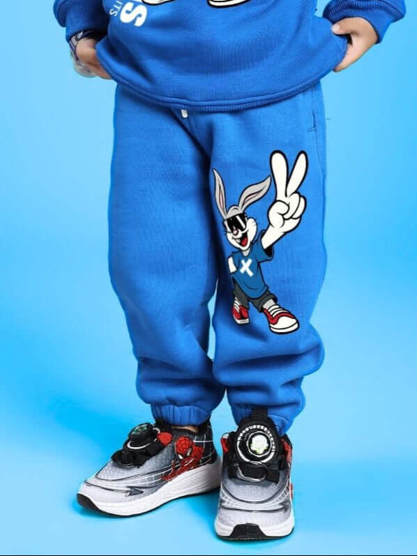 Child wearing Adventure Bunny Fleece Jogger for Boys and Girls Blue with playful bunny design.