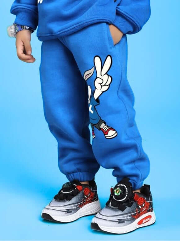ADVENTURE BUNNY FLEECE JOGGER FOR BOYS AND GIRLS BLUE, featuring playful design and ultra-soft material for kids' active wear.