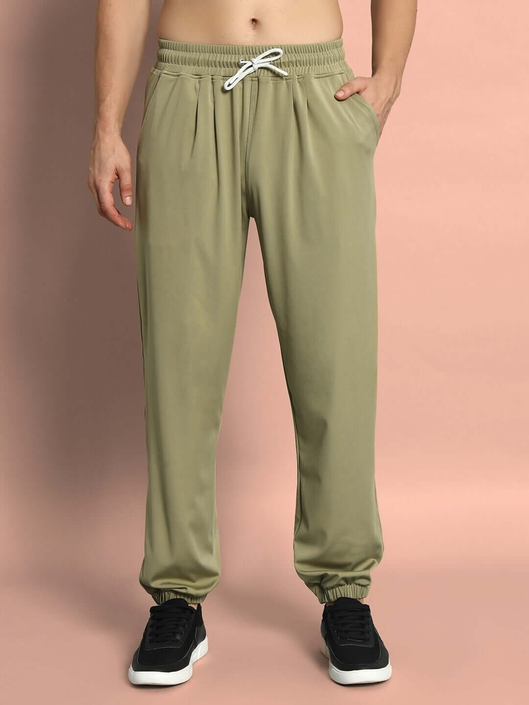 Olive green casual jogger pants with custom fit option, tailored by DUDS. Comfortable and stylish relaxed wear.