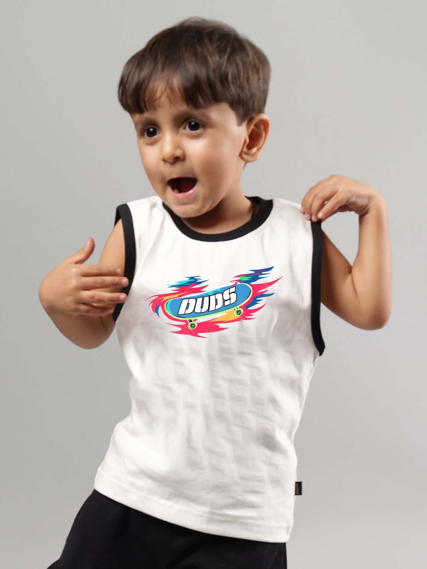 Child wearing off-white Alien summer t-shirt for boys & girls by DUDS, showcasing vibrant design and sleeveless fit.