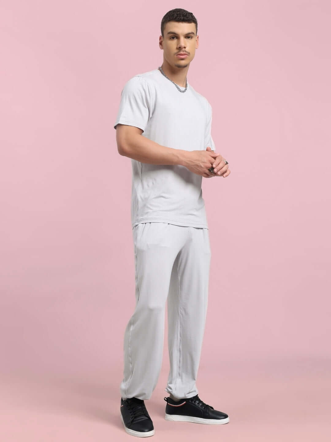 Man wearing AMBLE CO-ORD SET in grey, featuring premium heavy gauge modal fabric, ideal for comfort and style.