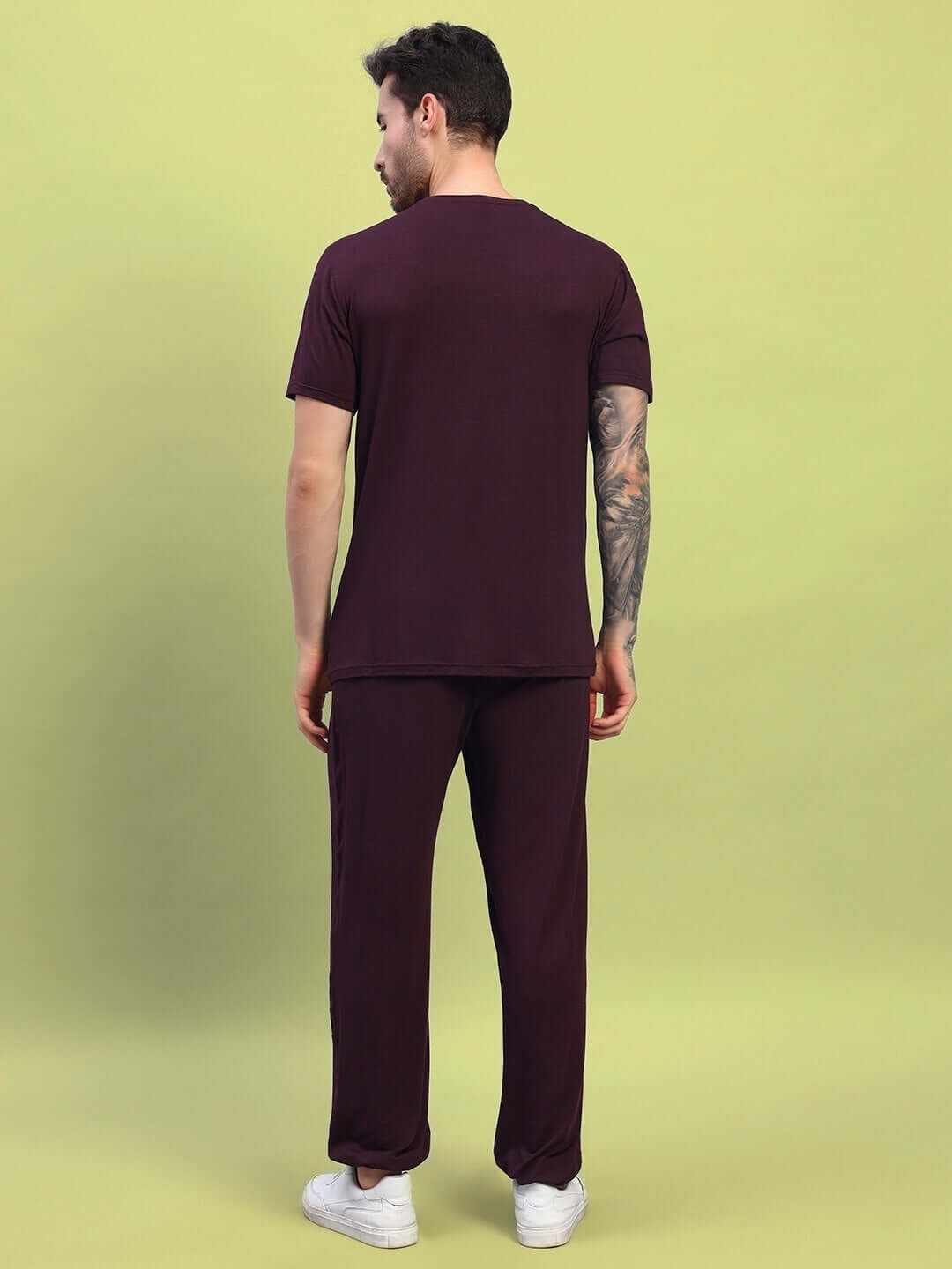 Back view of man wearing AMBLE CO-ORD SET in maroon, made with premium heavy gauge modal fabric, showcasing comfortable fit and design.