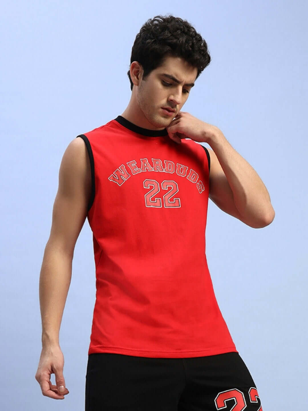 Man wearing red AMIGA gym t-shirt with Wear Duds branding.