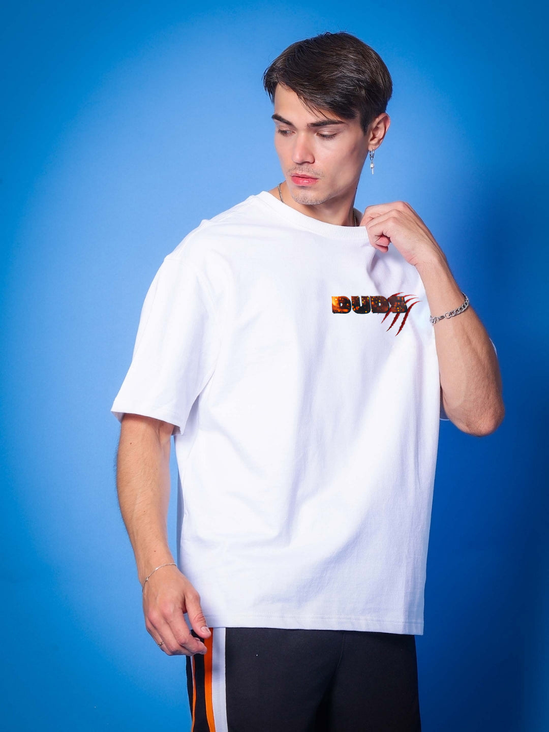 Person wearing ANGRY PANTHER OVERSIZED T-SHIRT WHITE against blue background