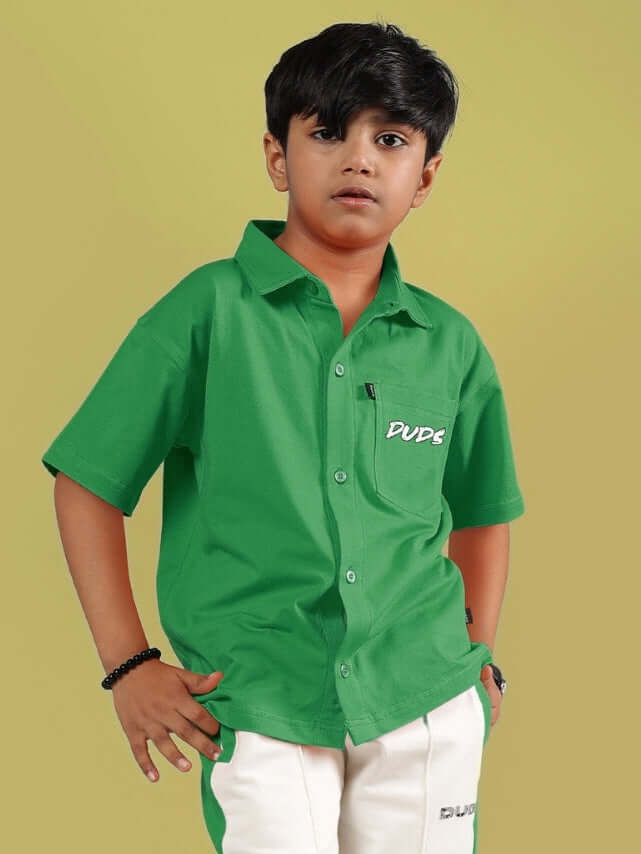 Boy wearing Angry Sponge green shirt from DUDS, tailored for boys and girls, customizable size option, perfect casual wear.
