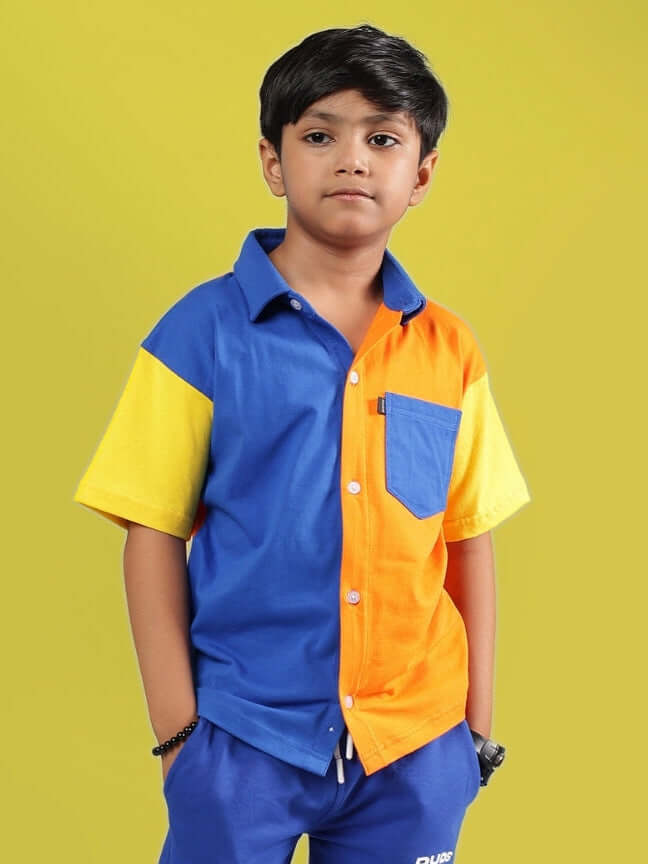 Child wearing Apex Shirt for Boys & Girls in Multi Blue by DUDS, featuring vibrant color block design and tailored comfort fit.