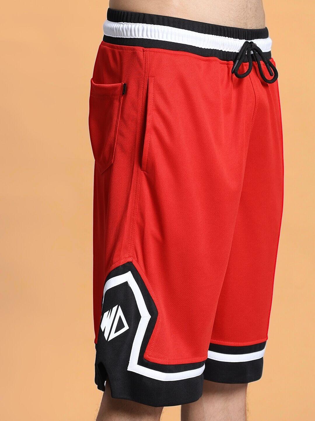 Red Armado regular fit shorts with black and white accents, featuring a side pocket and drawstring waist for a customizable fit.