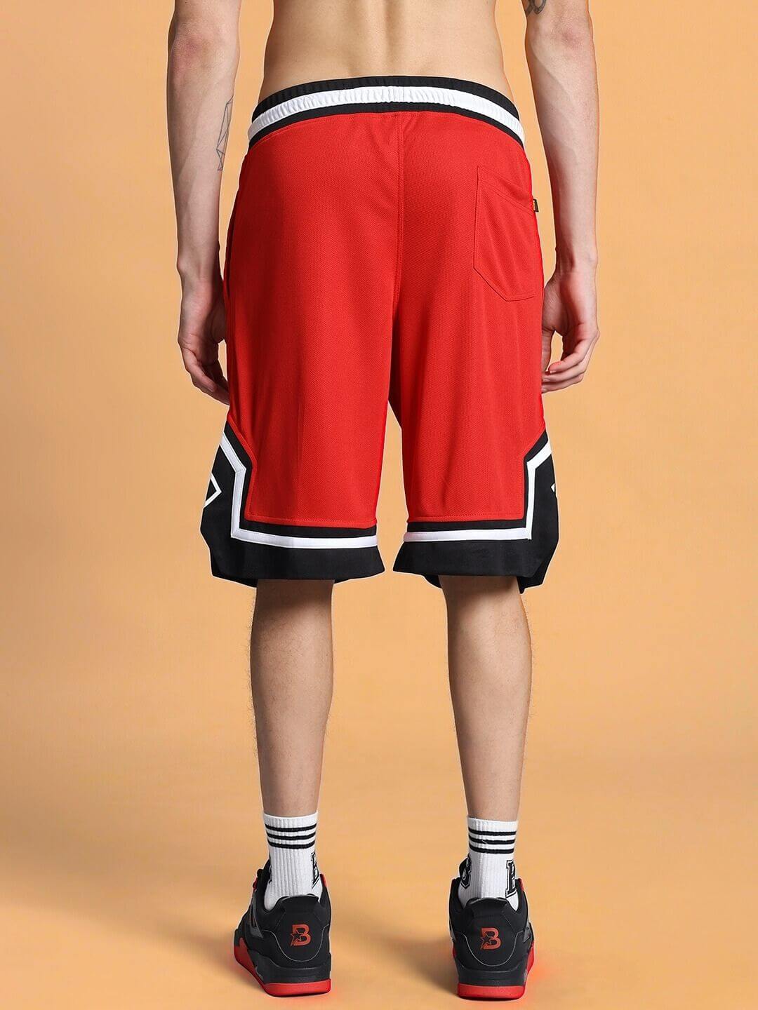 Back view of Armado regular fit red shorts, showcasing design details and comfortable fit, ideal for custom-sized orders.