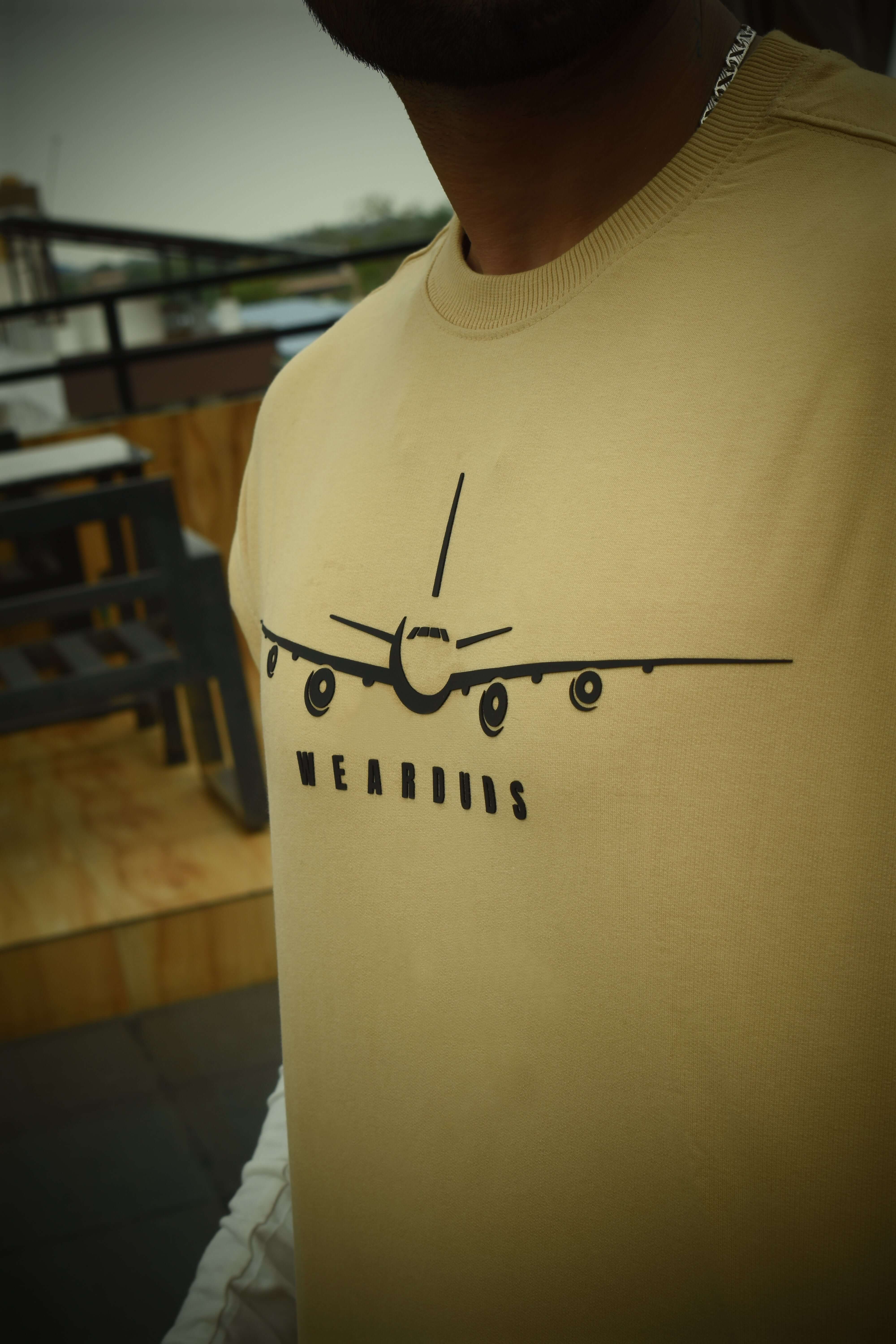 AVAITOR Designer Oversized Beige T-Shirt featuring an airplane graphic, made from premium cotton French terry with elastane.