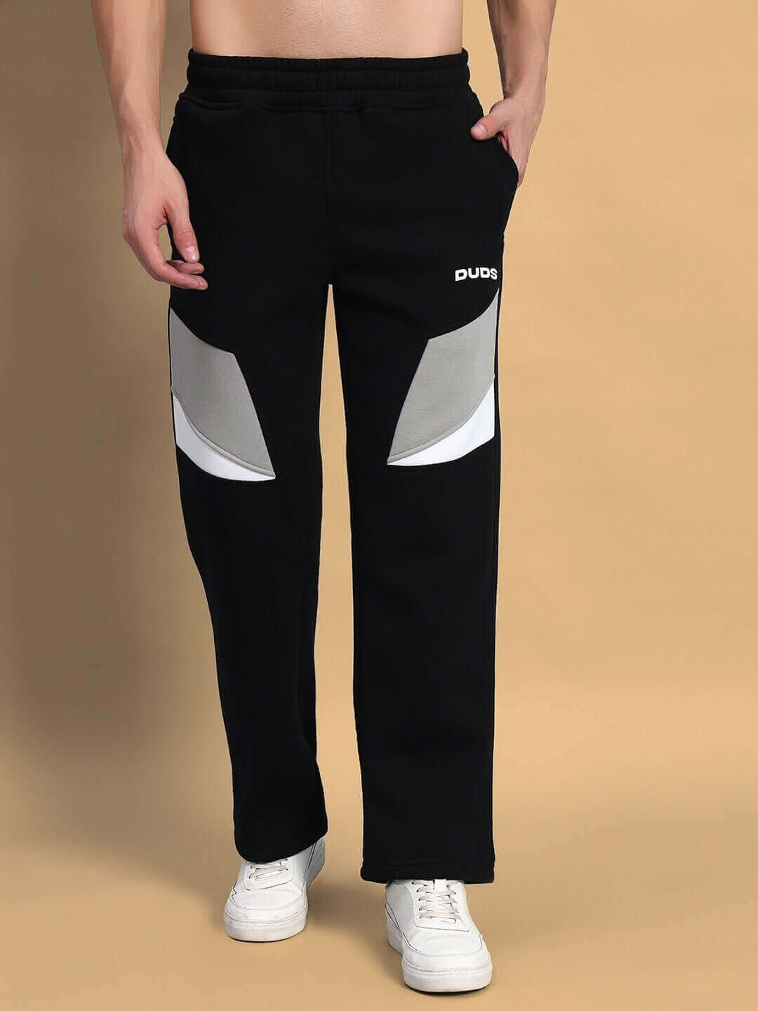 Model wearing AVIATOR FLEECE CARGO PANT BLACK from WEAR DUDS, showing streetwear-inspired design and premium warmth.