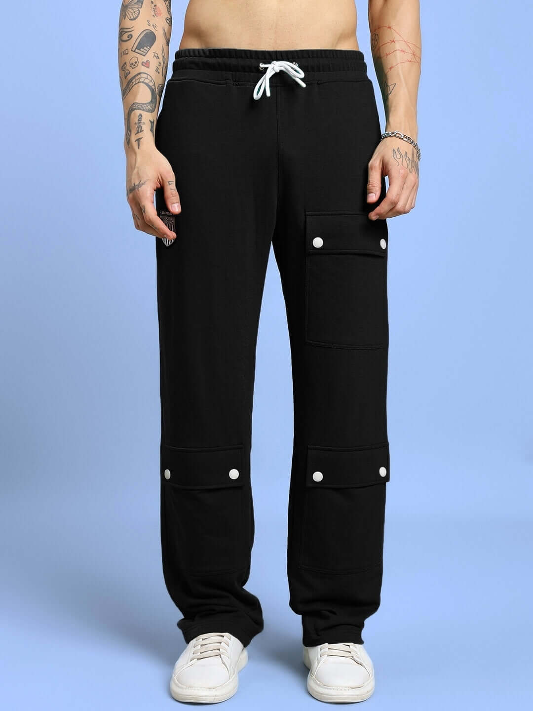 Black baggy jogger pants with flap pockets, elastic waistband, made to order by DUDS. Custom fit options available for prepaid orders.