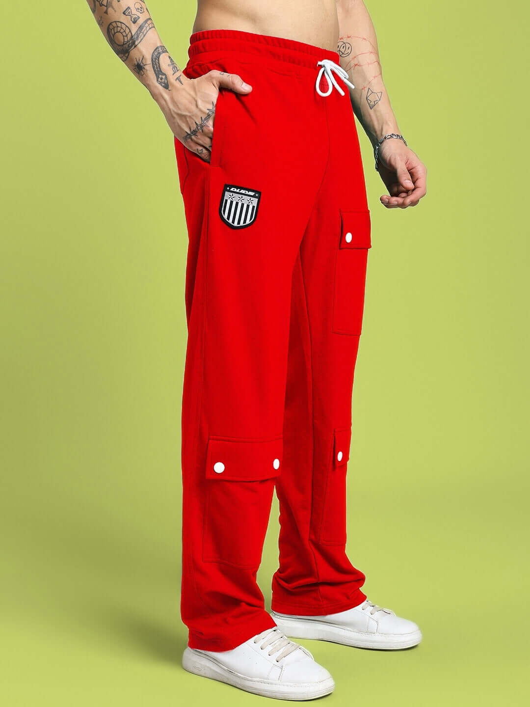 Red awesome flap pocket baggy jogger by DUDS, tailored with dedication, featuring customizable options and unique design.