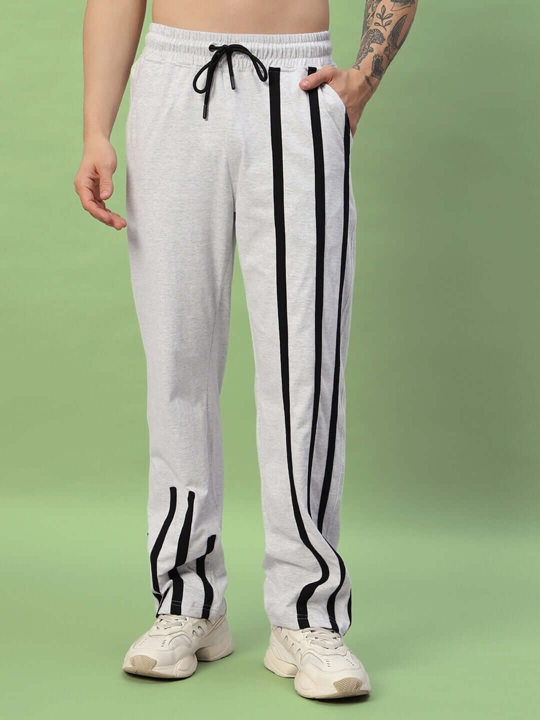 BASTILLE JOGGER in Melange Grey with black stripe design, shown worn with white sneakers. Made to order by DUDS.