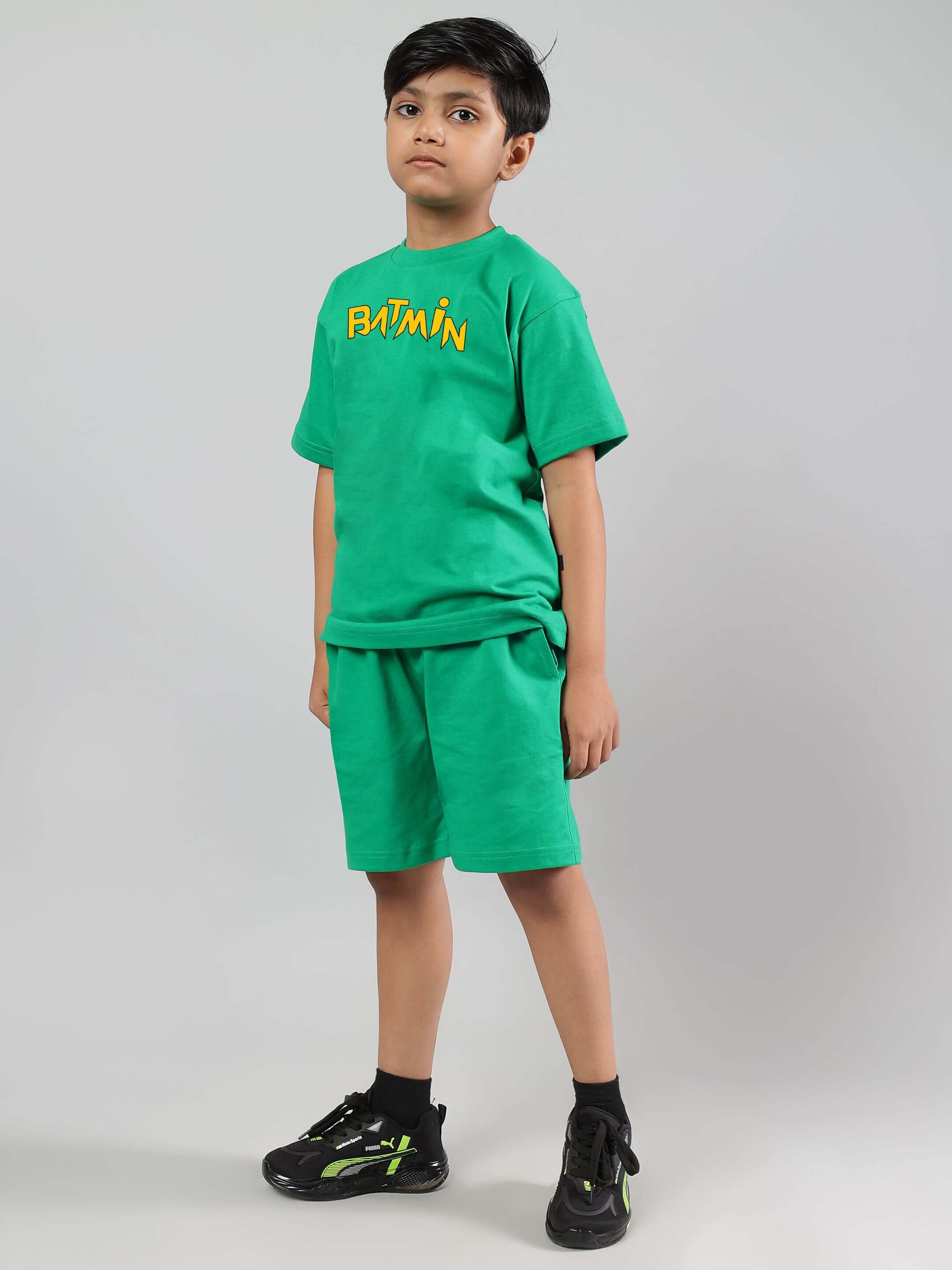 Child wearing BATMIN CO-ORD FOR BOYS GIRLS GREEN outfit with Batmin graphic tee and shorts in vibrant green color.