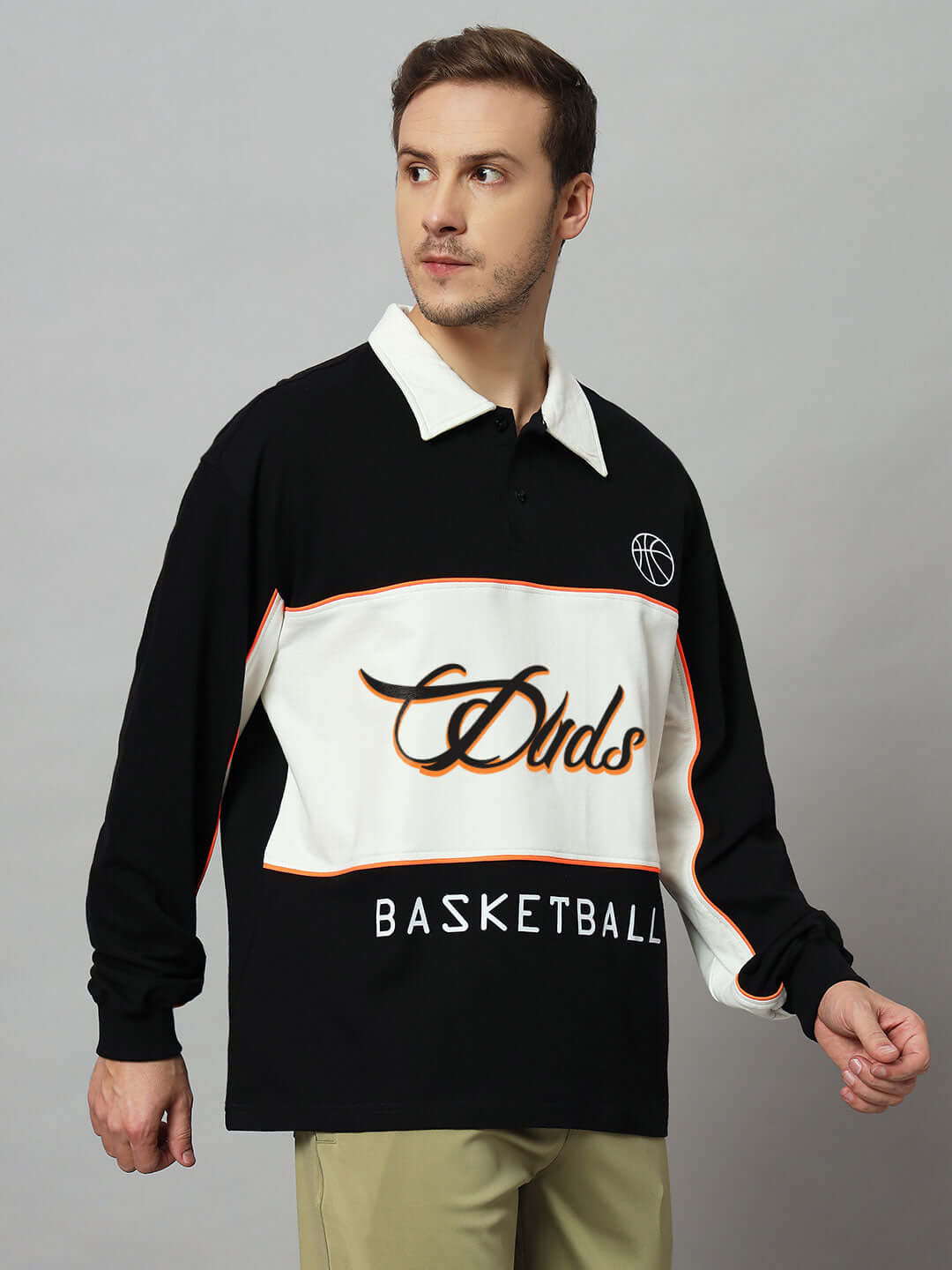 Alt Tag: Model wearing B-BALL Oversized Sweatshirt in Black-Off White, premium cotton French terry lycra, 240 GSM bio-washed fabric.