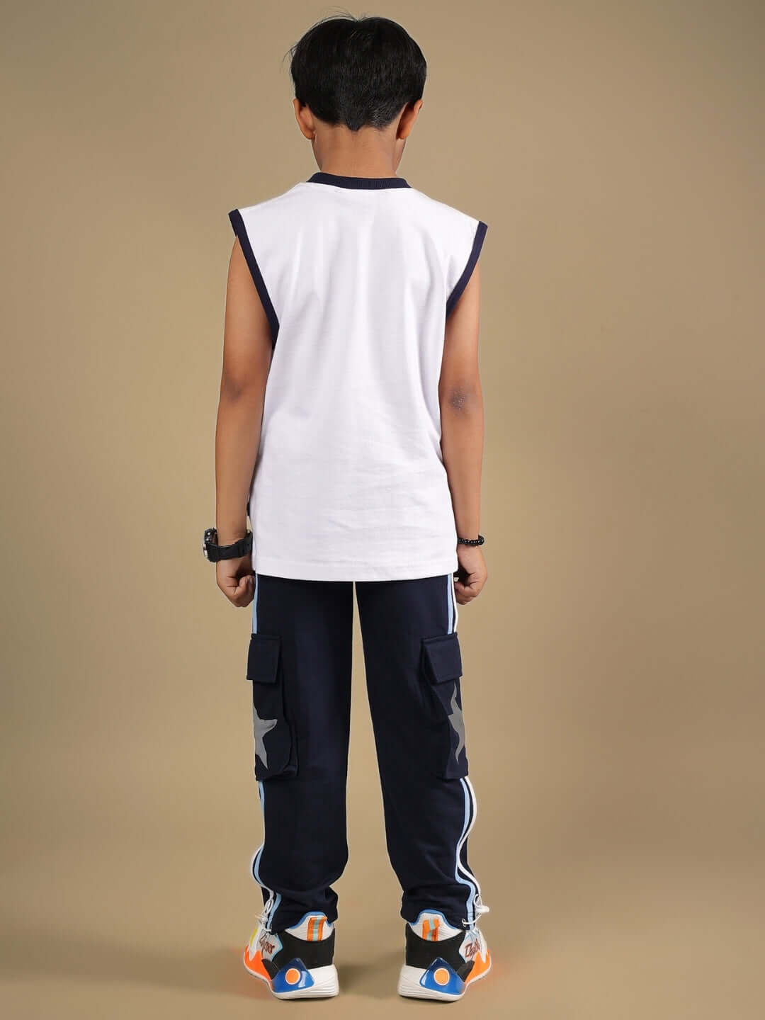 BEEP BEEP CO-ORD FOR BOYS & GIRLS WHITE NAVY featuring a child wearing white and navy outfit from the back view.