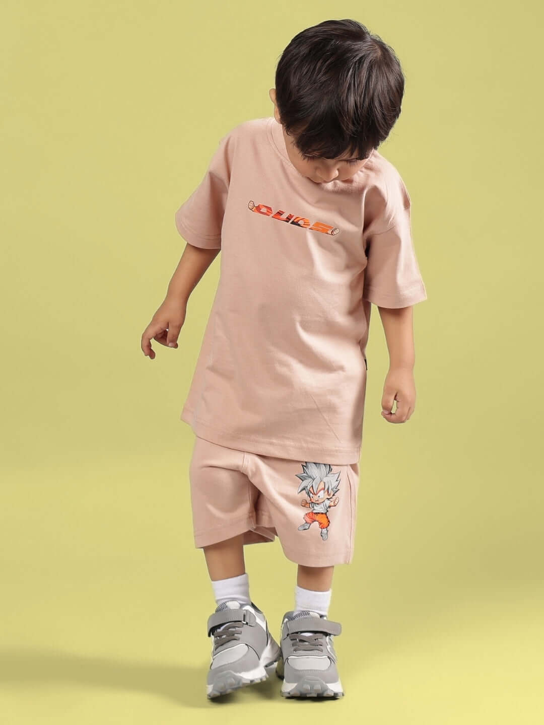 GOHAN SUMMER CO-ORD FOR BOYS & GIRLS BEIGE worn by a child, featuring beige color with graphic design, ideal for summer fashion.