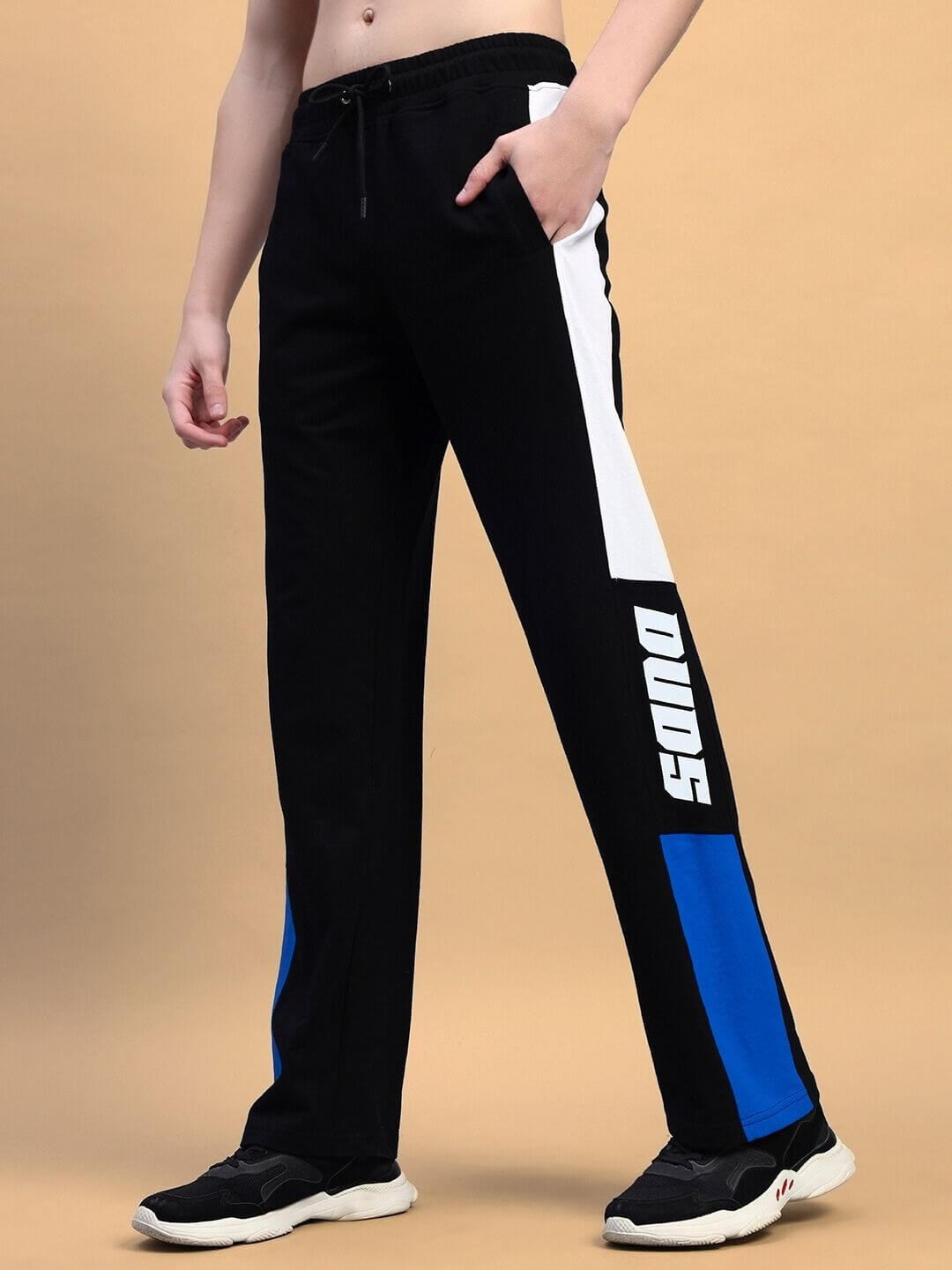 Alt Tag: Stylish black blue relaxed-fit joggers with white stripe, crafted by DUDS tailors. Perfect for comfort and customization.
